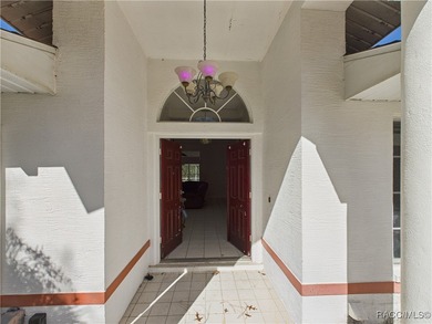 Charming 3-bedroom, 2-bathroom pool home nestled in the serene on Sugarmill Woods Golf and Country Club in Florida - for sale on GolfHomes.com, golf home, golf lot