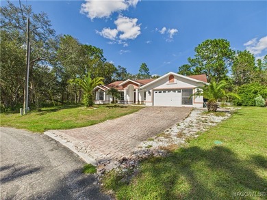 Charming 3-bedroom, 2-bathroom pool home nestled in the serene on Sugarmill Woods Golf and Country Club in Florida - for sale on GolfHomes.com, golf home, golf lot