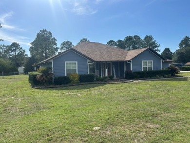 Spacious 3BR+sunroom, 2.5 Bathrooms home in the highly desirable on Chiefland Golf and Country Club in Florida - for sale on GolfHomes.com, golf home, golf lot