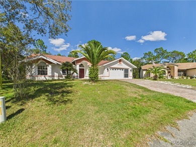 Charming 3-bedroom, 2-bathroom pool home nestled in the serene on Sugarmill Woods Golf and Country Club in Florida - for sale on GolfHomes.com, golf home, golf lot