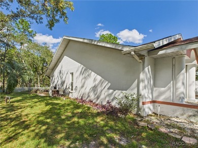 Charming 3-bedroom, 2-bathroom pool home nestled in the serene on Sugarmill Woods Golf and Country Club in Florida - for sale on GolfHomes.com, golf home, golf lot