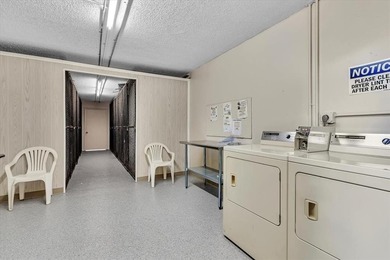 Experience unparalleled luxury in this reduced price *stunning* on Wynmoor Golf Course in Florida - for sale on GolfHomes.com, golf home, golf lot