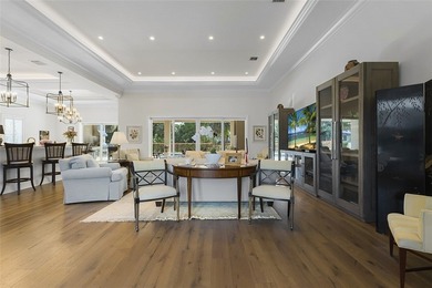 Custom-built in 2019, this stunning CBS golf course estate in on Bent Pine Golf Club in Florida - for sale on GolfHomes.com, golf home, golf lot