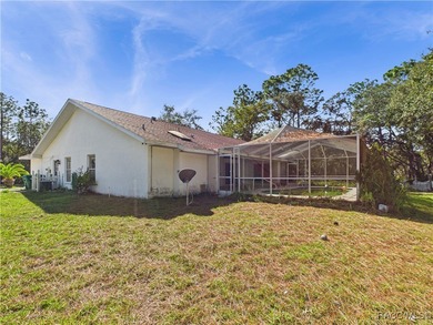 Charming 3-bedroom, 2-bathroom pool home nestled in the serene on Sugarmill Woods Golf and Country Club in Florida - for sale on GolfHomes.com, golf home, golf lot
