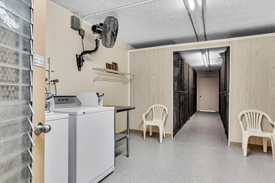 Experience unparalleled luxury in this reduced price *stunning* on Wynmoor Golf Course in Florida - for sale on GolfHomes.com, golf home, golf lot