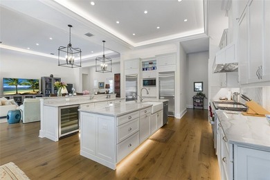 Custom-built in 2019, this stunning CBS golf course estate in on Bent Pine Golf Club in Florida - for sale on GolfHomes.com, golf home, golf lot