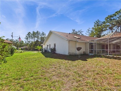 Charming 3-bedroom, 2-bathroom pool home nestled in the serene on Sugarmill Woods Golf and Country Club in Florida - for sale on GolfHomes.com, golf home, golf lot