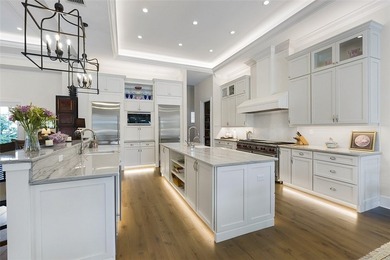 Custom-built in 2019, this stunning CBS golf course estate in on Bent Pine Golf Club in Florida - for sale on GolfHomes.com, golf home, golf lot