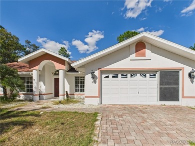 Charming 3-bedroom, 2-bathroom pool home nestled in the serene on Sugarmill Woods Golf and Country Club in Florida - for sale on GolfHomes.com, golf home, golf lot
