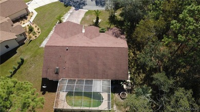 Charming 3-bedroom, 2-bathroom pool home nestled in the serene on Sugarmill Woods Golf and Country Club in Florida - for sale on GolfHomes.com, golf home, golf lot