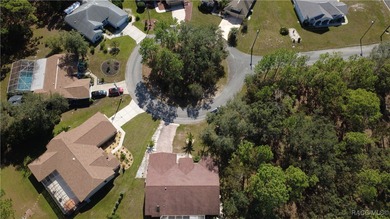 Charming 3-bedroom, 2-bathroom pool home nestled in the serene on Sugarmill Woods Golf and Country Club in Florida - for sale on GolfHomes.com, golf home, golf lot