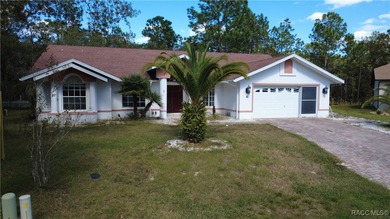 Charming 3-bedroom, 2-bathroom pool home nestled in the serene on Sugarmill Woods Golf and Country Club in Florida - for sale on GolfHomes.com, golf home, golf lot
