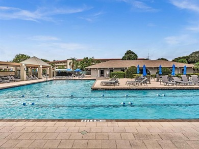 Experience unparalleled luxury in this reduced price *stunning* on Wynmoor Golf Course in Florida - for sale on GolfHomes.com, golf home, golf lot