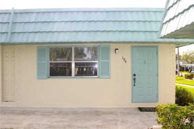 Steps from the North Clubhouse, this private and peaceful condo on Kings Point Executive Golf Course in Florida - for sale on GolfHomes.com, golf home, golf lot