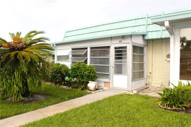 Steps from the North Clubhouse, this private and peaceful condo on Kings Point Executive Golf Course in Florida - for sale on GolfHomes.com, golf home, golf lot