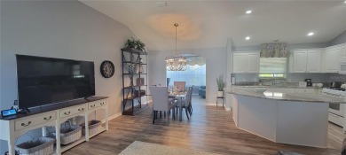 MOVE IN READY - UPGRADED - TURNKEY -GOLF CART INCLUDED- NO BOND on The Links of Spruce Creek in Florida - for sale on GolfHomes.com, golf home, golf lot
