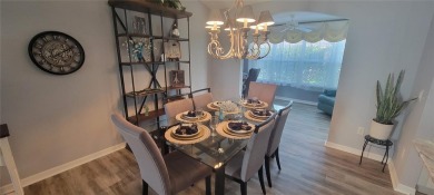 MOVE IN READY - UPGRADED - TURNKEY -GOLF CART INCLUDED- NO BOND on The Links of Spruce Creek in Florida - for sale on GolfHomes.com, golf home, golf lot