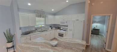 MOVE IN READY - UPGRADED - TURNKEY -GOLF CART INCLUDED- NO BOND on The Links of Spruce Creek in Florida - for sale on GolfHomes.com, golf home, golf lot