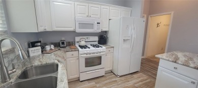 MOVE IN READY - UPGRADED - TURNKEY -GOLF CART INCLUDED- NO BOND on The Links of Spruce Creek in Florida - for sale on GolfHomes.com, golf home, golf lot