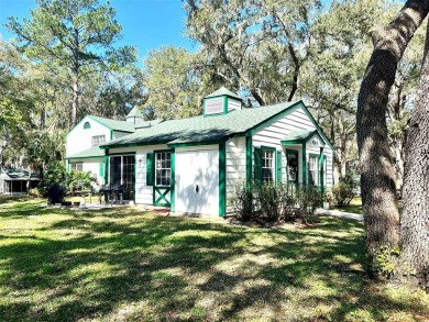 Beautifully nestled ground floor condo among the natural beauty on Country Club At Silver Springs Shores in Florida - for sale on GolfHomes.com, golf home, golf lot