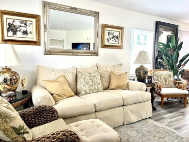 Beautifully nestled ground floor condo among the natural beauty on Country Club At Silver Springs Shores in Florida - for sale on GolfHomes.com, golf home, golf lot