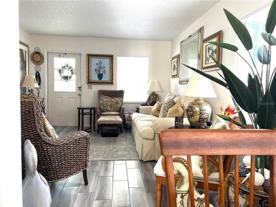 Beautifully nestled ground floor condo among the natural beauty on Country Club At Silver Springs Shores in Florida - for sale on GolfHomes.com, golf home, golf lot