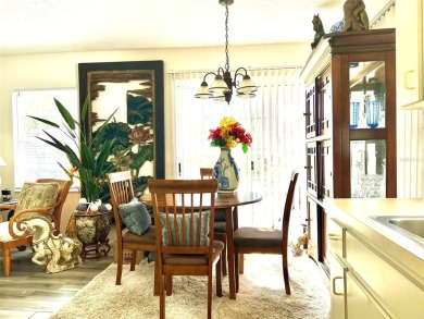 Beautifully nestled ground floor condo among the natural beauty on Country Club At Silver Springs Shores in Florida - for sale on GolfHomes.com, golf home, golf lot