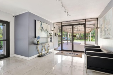 Discover serene lakeside living in this spacious 1-bedroom, 1 on Palm-Aire Country Club and Resort - Palms in Florida - for sale on GolfHomes.com, golf home, golf lot