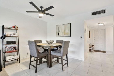 Discover serene lakeside living in this spacious 1-bedroom, 1 on Palm-Aire Country Club and Resort - Palms in Florida - for sale on GolfHomes.com, golf home, golf lot