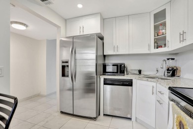 Discover serene lakeside living in this spacious 1-bedroom, 1 on Palm-Aire Country Club and Resort - Palms in Florida - for sale on GolfHomes.com, golf home, golf lot