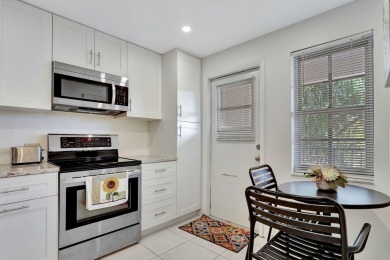 Discover serene lakeside living in this spacious 1-bedroom, 1 on Palm-Aire Country Club and Resort - Palms in Florida - for sale on GolfHomes.com, golf home, golf lot