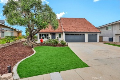 Welcome to this stunning residence overlooking the lush greens on Anaheim Hills Golf Course in California - for sale on GolfHomes.com, golf home, golf lot