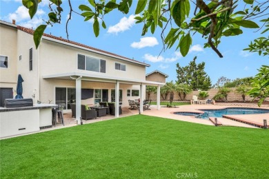 Welcome to this stunning residence overlooking the lush greens on Anaheim Hills Golf Course in California - for sale on GolfHomes.com, golf home, golf lot