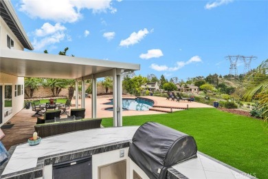 Welcome to this stunning residence overlooking the lush greens on Anaheim Hills Golf Course in California - for sale on GolfHomes.com, golf home, golf lot
