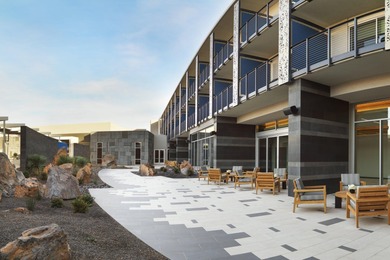 This top-floor unit has stunning Red Rock views to the East on Entrada at Snow Canyon in Utah - for sale on GolfHomes.com, golf home, golf lot