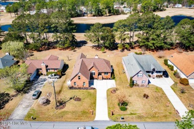 SCHEDULE YOUR SHOWING!!! COZY AND SERENE WITH THE ABILITY FOR on Harbour Point Golf Club in North Carolina - for sale on GolfHomes.com, golf home, golf lot
