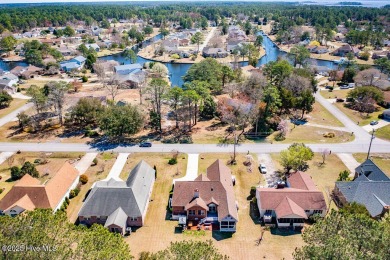 SCHEDULE YOUR SHOWING!!! COZY AND SERENE WITH THE ABILITY FOR on Harbour Point Golf Club in North Carolina - for sale on GolfHomes.com, golf home, golf lot
