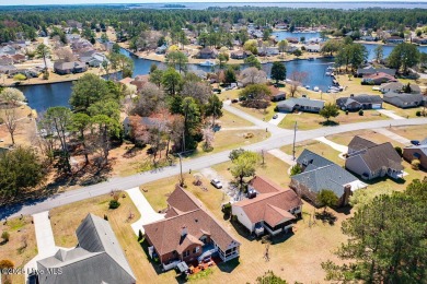 SCHEDULE YOUR SHOWING!!! COZY AND SERENE WITH THE ABILITY FOR on Harbour Point Golf Club in North Carolina - for sale on GolfHomes.com, golf home, golf lot