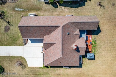 SCHEDULE YOUR SHOWING!!! COZY AND SERENE WITH THE ABILITY FOR on Harbour Point Golf Club in North Carolina - for sale on GolfHomes.com, golf home, golf lot