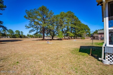 SCHEDULE YOUR SHOWING!!! COZY AND SERENE WITH THE ABILITY FOR on Harbour Point Golf Club in North Carolina - for sale on GolfHomes.com, golf home, golf lot