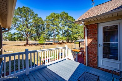 SCHEDULE YOUR SHOWING!!! COZY AND SERENE WITH THE ABILITY FOR on Harbour Point Golf Club in North Carolina - for sale on GolfHomes.com, golf home, golf lot