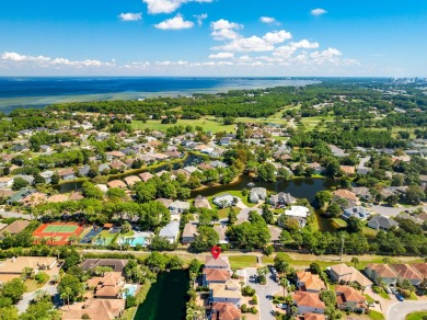 Coastal elegance is calling in the heart of Destin with this on Regatta Bay Golf and Country Club in Florida - for sale on GolfHomes.com, golf home, golf lot