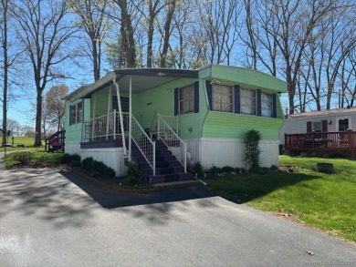Nice Mobile Home In Country Club Estates. Home offers covered on The University Club of Connecticut in Connecticut - for sale on GolfHomes.com, golf home, golf lot