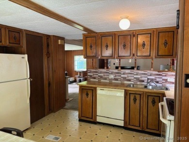 Nice Mobile Home In Country Club Estates. Home offers covered on The University Club of Connecticut in Connecticut - for sale on GolfHomes.com, golf home, golf lot