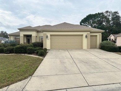 Great 3/2 CBS Johnstown Model with Golf Cart Garage good on Eagle Ridge At Spruce Creek Country Club in Florida - for sale on GolfHomes.com, golf home, golf lot