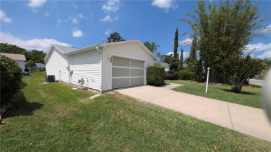 BOND PAID!! Welcome to 17930 SE 83rd Melody Avenue, nestled in on The Links of Spruce Creek in Florida - for sale on GolfHomes.com, golf home, golf lot