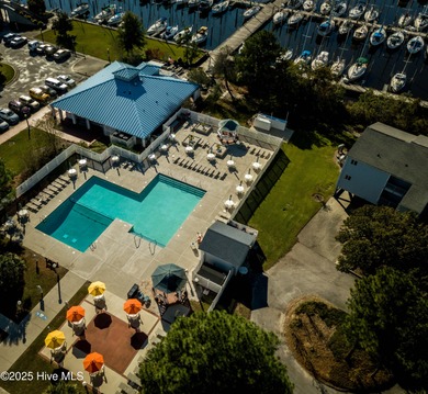 Beautiful Live Oak trees adorn this large corner lot in on Harbour Point Golf Club in North Carolina - for sale on GolfHomes.com, golf home, golf lot