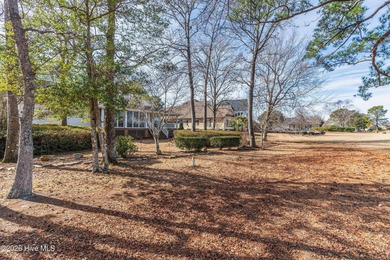 Custom-built home nestled on a quiet cul-de-sac in the highly on Ocean Ridge Plantation in North Carolina - for sale on GolfHomes.com, golf home, golf lot