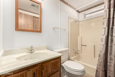 Enjoy easy, low-maintenance living in this move-in ready on Sun Lakes Country Club in Arizona - for sale on GolfHomes.com, golf home, golf lot