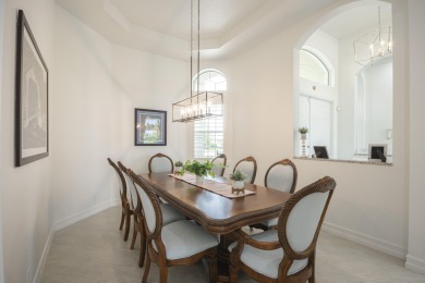 Live luxuriously & comfortably in this single-level Beaumont on Jupiter Country Club in Florida - for sale on GolfHomes.com, golf home, golf lot